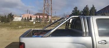Qoruyucular, zaşitniklər: Pikap üçün paslanmayan poladdan roll-bar/arxa qoruyucu karkas. - — 1