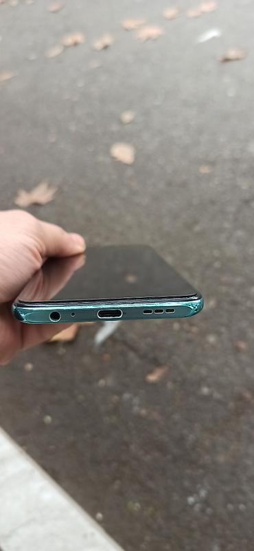 en yaxsi modem hansidir: Xiaomi 128 GB, rəng - Yaşıl, 
 Barmaq izi — 9