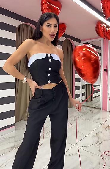 Kompleti: ✅Ženski komplet – strapless korset top i široke pantalone
✅3000 din — 3