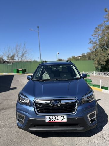 решетка на камри 70: Кроссовер Subaru Forester синего цвета, оснащенный рейлингами на