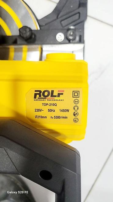 Инструменттер: Торцовочная пила ROLF TOP-210Q Характеристики: - Напряжение: 220 В — 3