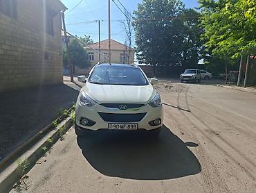 hyundai ıx35: Hyundai ix35, ağ rəng, 4WD (tam ötürücülü) krossover. Xüsusiyyətlər — 7