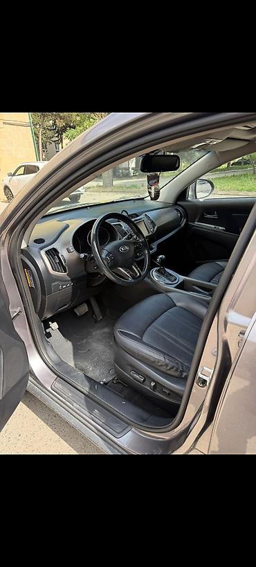 Kia: Kia Sportage: 2 l | 2014 il Krossover — 2