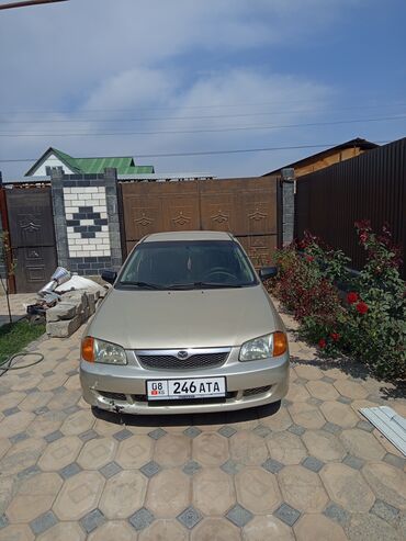 Mazda Protege: 1999 г., Бензин, Седан