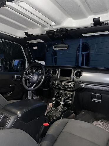 машина ягуар: Jeep Wrangler: 2023 г., 2 л, Автомат, Гибрид, Внедорожник — 7