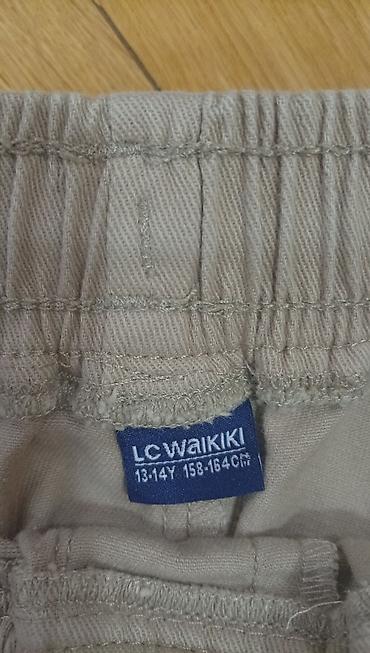 Детский мир: LC Waikiki uşaq/yeniyetmə şalvarı - Model: idman üslublu dar kəsim — 2