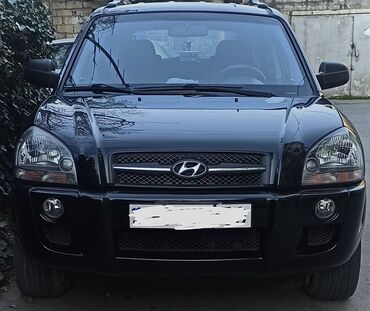 ağır texnika: Hyundai Tucson: 2 l | 2007 il Krossover