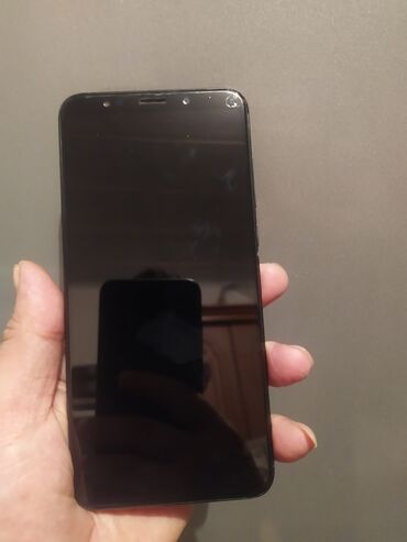 150 manata telefonlar: Xiaomi Redmi 5 Plus, 32 ГБ, цвет - Черный, 
 Сенсорный, Отпечаток пальца, Две SIM карты