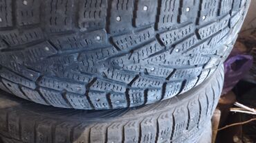 шипованные шины: Комплект зимних шин с шипами. - Тип: шины зимние, шипованные -