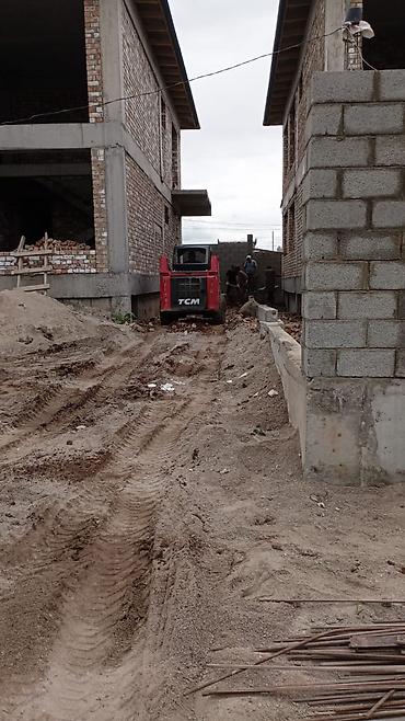 мини трактор услуга: Услуги мини-погрузчика TCM (skid steer) - Маневренный мини-погрузчик — 8
