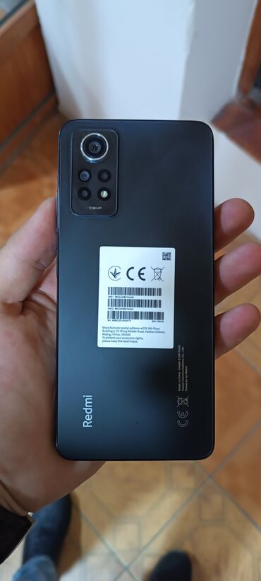 telefon satilir: Xiaomi 12 Pro, 256 GB, rəng - Qara, 
 Sensor, Barmaq izi, İki sim kartlı