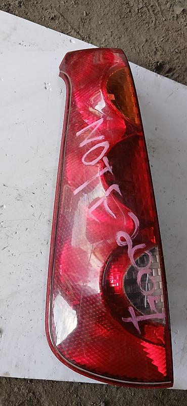 задний стоп ниссан: Задний левый фонарь (стоп-сигнал) для Nissan Note, год 2007. - — 2