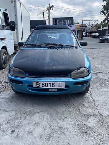 фара мазда 121: Mazda 121: 1991 г., Седан — 1