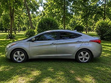 фольксваген пассат 1: Hyundai Elantra: 1.8 л | 2013 г. Седан — 2