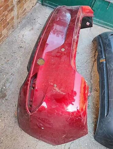 globber 4 in 1: BRANIK CRVENI ZA MAZDA 3 | Mazda 3 zadnji branik ostecen utisnit I — 1