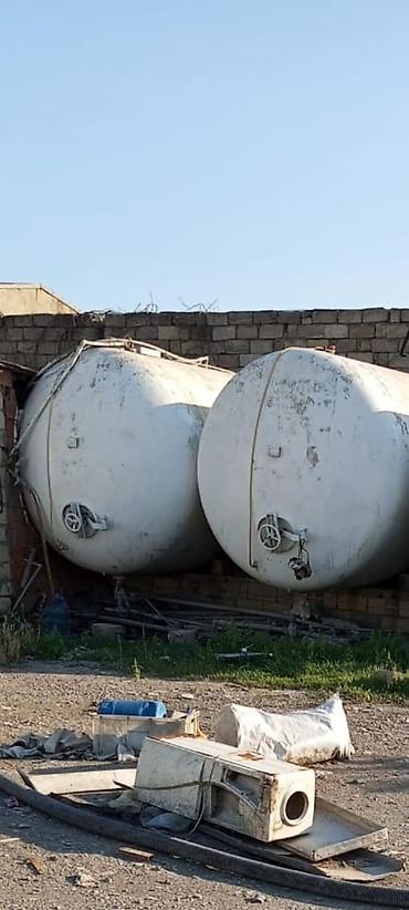 ev qizdiricisi: 25 tonluq emal çəni. Üfüqi yerləşimli, silindrik formalı iri həcmli — 4