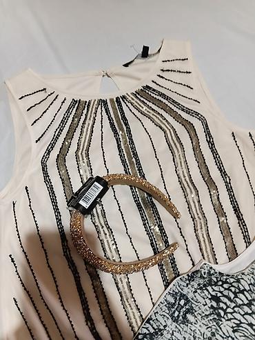 Kompleti: Ženski komplet – 3 topa + rajf - Elegantan krem bezrukavnik sa — 2