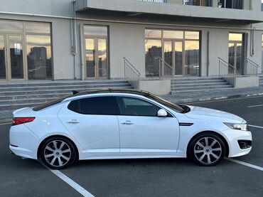 Kia: Kia Optima – ağ rəngli, zərif sedan Xarici xüsusiyyətlər: - Aqressiv — 14