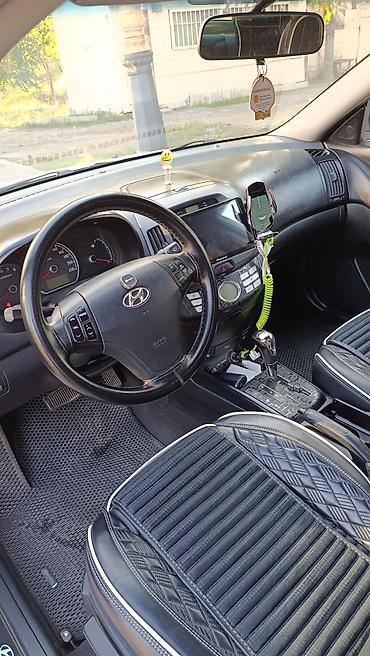 taube kondisioner: Hyundai Elantra, ağ rəngli sedan.nömre üstünde verilir peredok arxa — 5