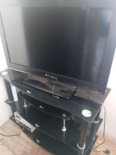 TV altlığı: LG televizor + 3 rəfli TV stendi dəsti Məhsul tərkibi: - LG LCD/LED — 1