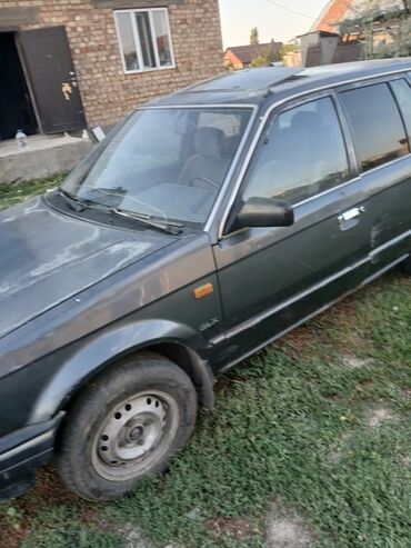 машины в рассрочка: Mazda 323: 1988 г., 1.4 л, Механика, Бензин, Универсал