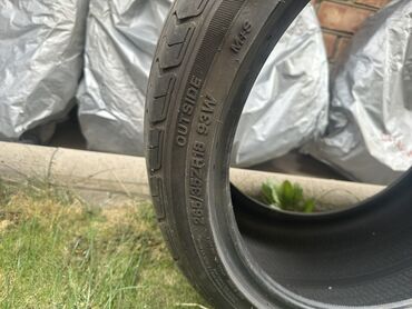 Шины: Комплект автомобильных шин (4 шт.) - Размеры: передние 235/40 R18 95W