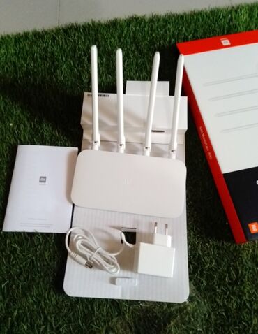 modem qiymeti: YENİDİR, mi router 4C, qutudadir, her şeyi təzədir, 4 antenasi var