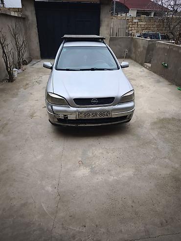 Opel: Opel Astra Caravan (universal) – gümüş rəngli kuzov, 5 qapı, dam — 8
