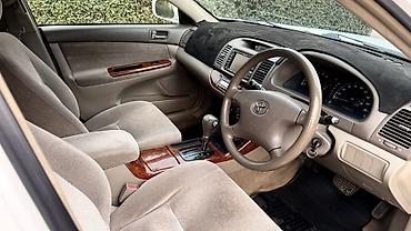 camry 2010: Toyota Camry: 2002 г. — 7