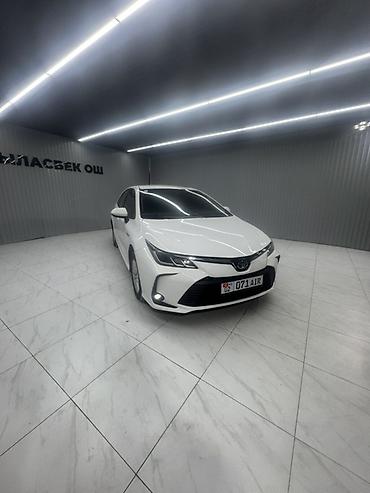 приус 2024: Toyota Corolla: 2022 г., Гибрид, Седан — 3