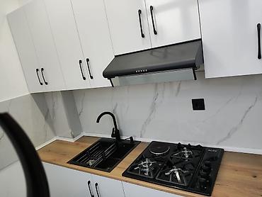 kupca: 2 otaqlı, Yeni tikili, 56 kv. m — 9