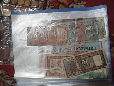 Монеты: Коллекция монет и банкнот России Состав: - Альбом «Памятные монеты — 27