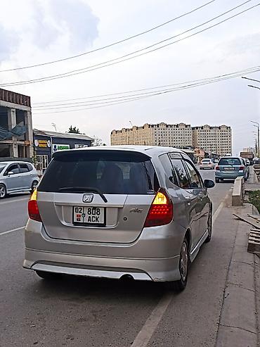 голф 2салон: Honda Fit: 2003 г., 1.3 л, Вариатор, Бензин, Хэтчбэк — 5