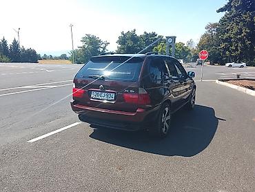 te 28 traktor satisi: BMW X5 (E53), bordoya çalan tünd qırmızı rəngdə SUV. Texniki və — 6