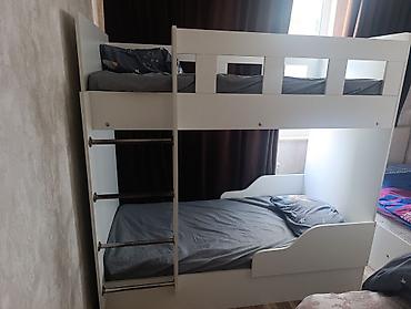 İkimertebe carpayi 220 manat.Ortopedik matrasladir.Olcu 180×90.650