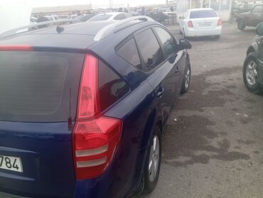 Kia: Kia Cee’d SW (universal), mavi rəng. - Geniş və funksional kuzov — 6