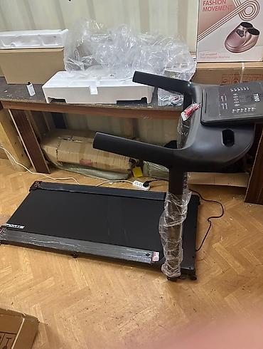 Беговая дорожка компактного типа с консолью управления. Особенности