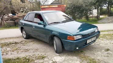 Mazda: Mazda 323: 1.6 l | 1994 il Sedan — 3