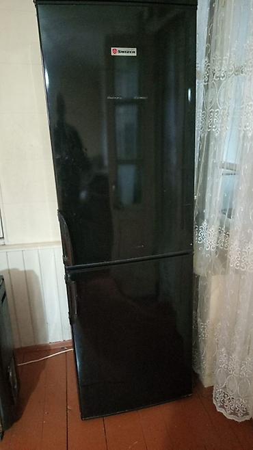 Swizer ikiqapılı soyuducu - Rəng: qara, şaquli korpus - Qapı düzümü lalafo.az -da Swizer ikiqapılı soyuducu - Rəng: qara, şaquli korpus - Qapı düzümü