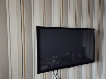 24 ekran smart tv: LG televizor – divardan asma tipli, nazik çərçivəli LED/LCD panel