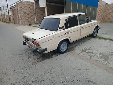 2106 salon: VAZ 2106 sedan – krem rəngli, arxa ötürməli, 4 qapılı. Xüsusiyyətlər — 2