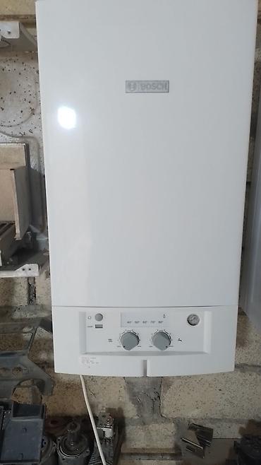 panel radiatorlar: Bosch qaz kombisi – divaraquraşdırılan, iki konturlu model — 1