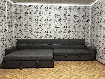 Угловой модульный диван-трансформер в темно‑серой обивке