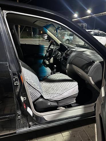 Mazda: Mazda 323: 2001 г., 1.6 л, Механика, Бензин, Седан — 8