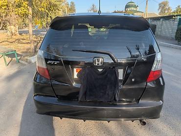 срочный: Honda Fit: 2010 г., 1.5 л, Автомат, Бензин, Универсал — 7