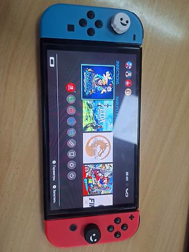 Nintendo Switch OLED: Продаю прошитую приставку нинтендо свитч олед, в связи срочной — 1
