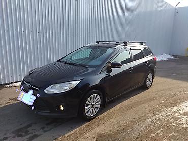 Продажа авто: Ford Focus: 2014 г., 1.6 л, Механика, Бензин, Универсал — 1