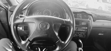 куплю мазда 626: Продается Mazda 626 в кузове седан, темно-зеленого цвета. Автомобиль