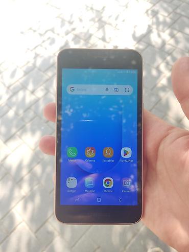 samsung core: Samsung Galaxy J2 Core, 8 GB, rəng - Qızılı, İki sim kartlı — 2