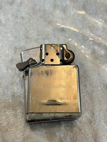 Zippo markalı yandırıcı üçün daxili mexanizm. Bu metal hissə